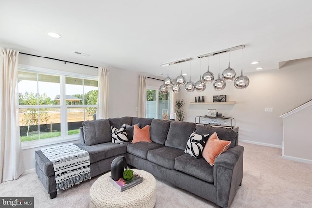 living room featuring light colored carpet