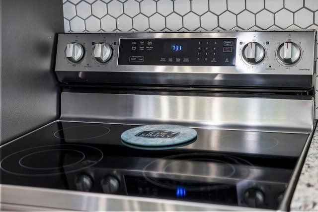 details featuring stainless steel range with electric cooktop