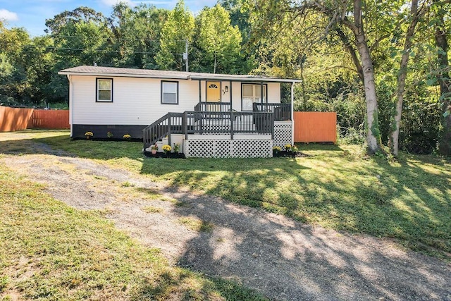 view of front of house with a front lawn