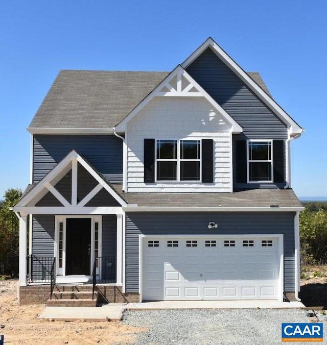 view of front of home with a garage