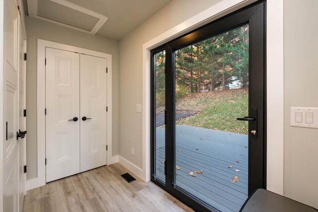 doorway featuring light hardwood / wood-style flooring