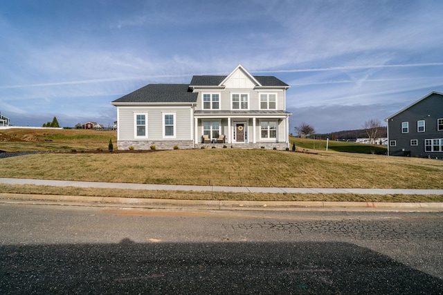 view of front of home with a front yard