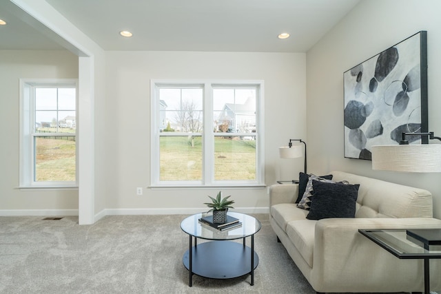 sitting room featuring carpet