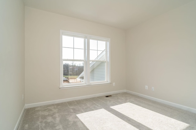 view of carpeted spare room