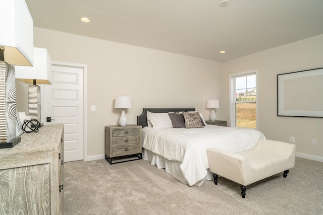 bedroom with light colored carpet