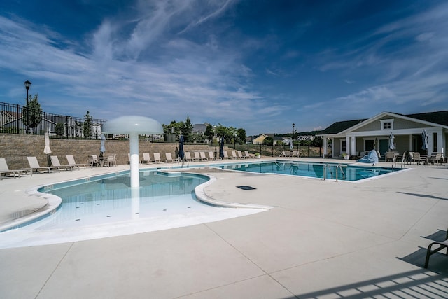 view of swimming pool featuring a patio