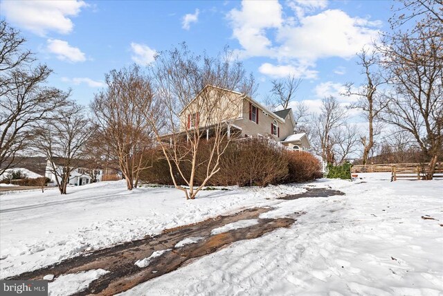 view of snow covered property