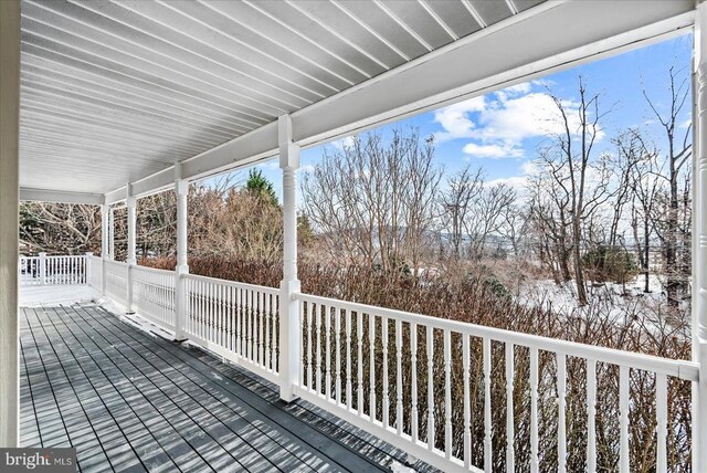 view of snow covered deck