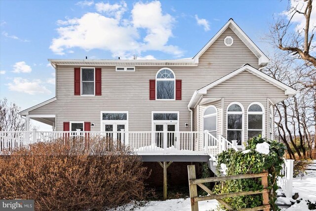 view of snow covered property