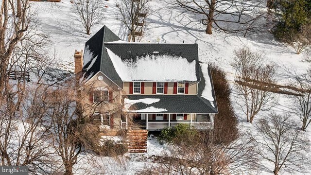 view of front of property featuring covered porch