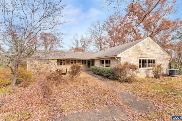 back of property with central AC unit