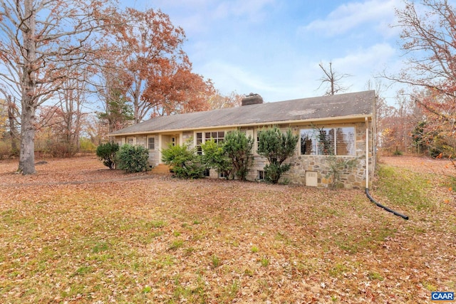 view of home's exterior with a lawn