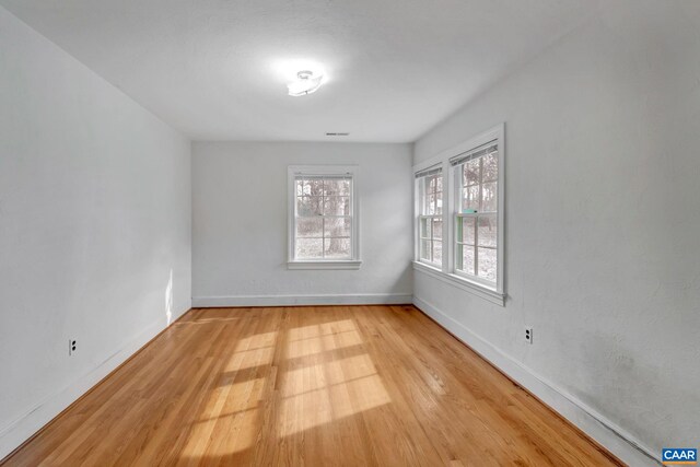 empty room featuring light hardwood / wood-style floors