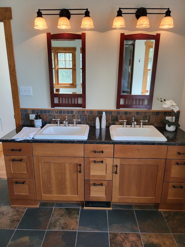 bathroom with vanity and backsplash