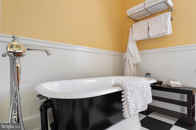 bathroom featuring a washtub