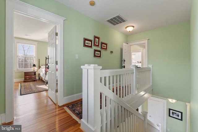 hallway featuring hardwood / wood-style floors