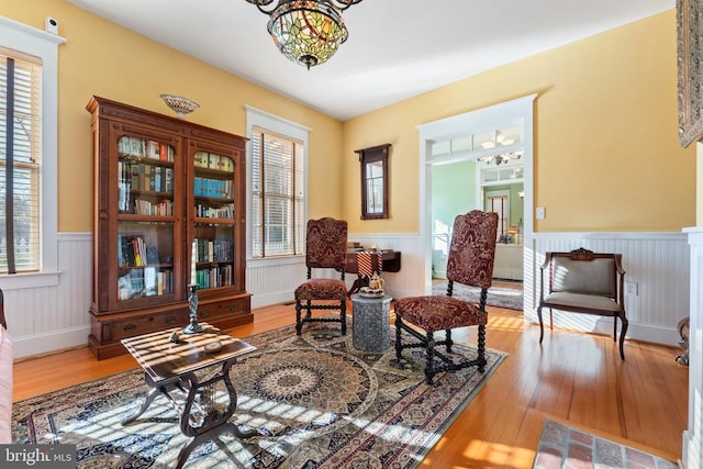 sitting room featuring light hardwood / wood-style floors