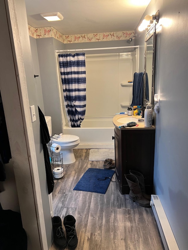 full bathroom featuring a baseboard radiator, wood-type flooring, vanity, toilet, and shower / bathtub combination with curtain
