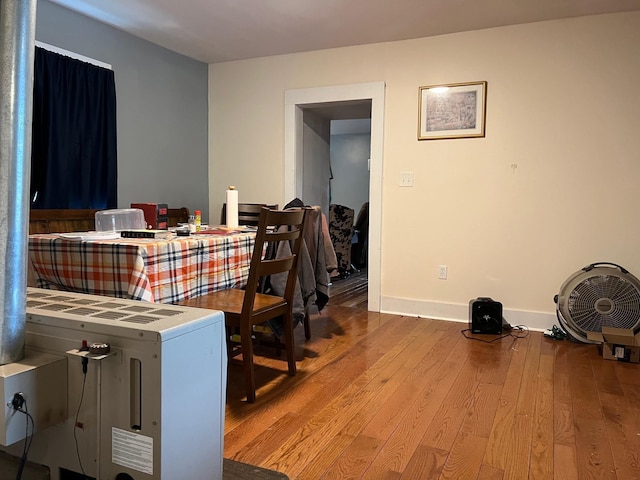 dining area with light hardwood / wood-style floors