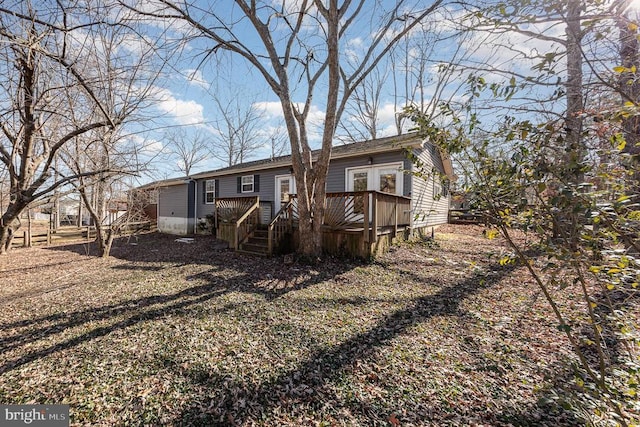 view of front of property with a deck