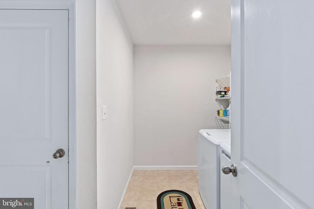 washroom with laundry area, recessed lighting, baseboards, and washer and dryer