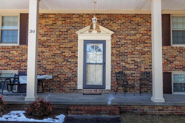 doorway to property featuring a porch