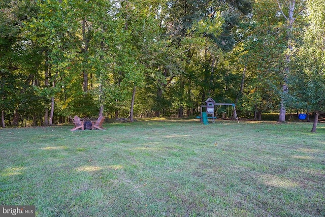 view of yard featuring playground community