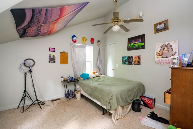 bedroom featuring lofted ceiling and ceiling fan