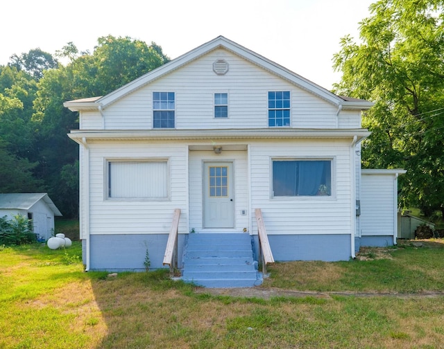 view of front of property with a front lawn