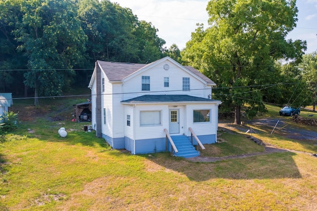 view of front of house with a front lawn