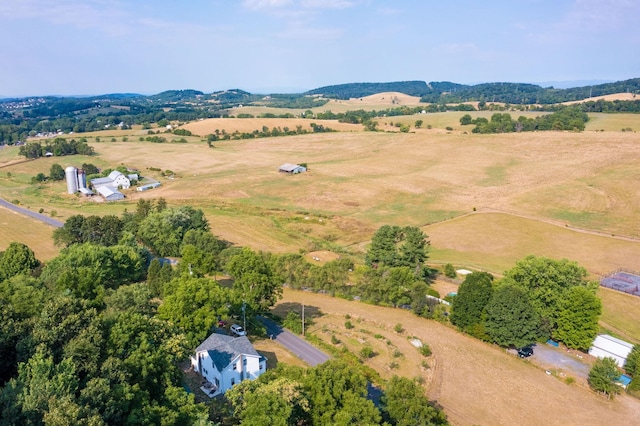 birds eye view of property featuring a rural view and a mountain view