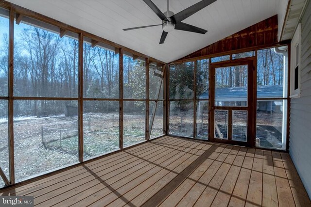 unfurnished sunroom featuring vaulted ceiling and ceiling fan