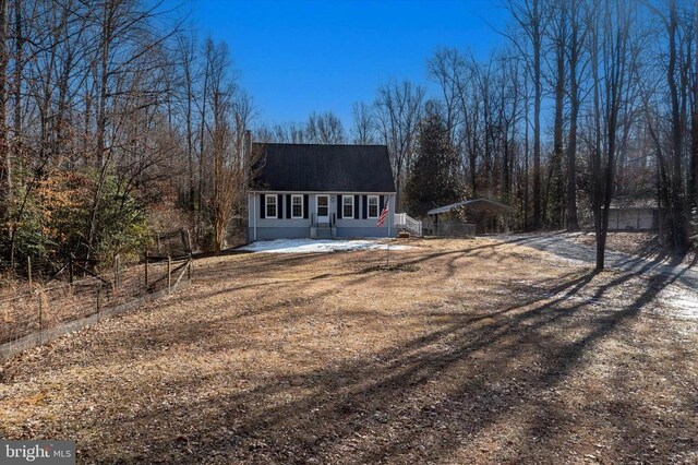 view of front of property with a carport