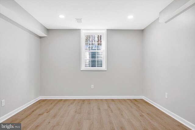 basement with light wood-type flooring