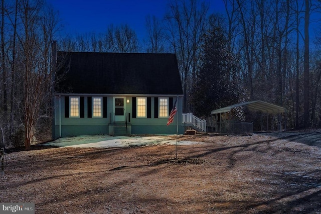 cape cod home with a carport