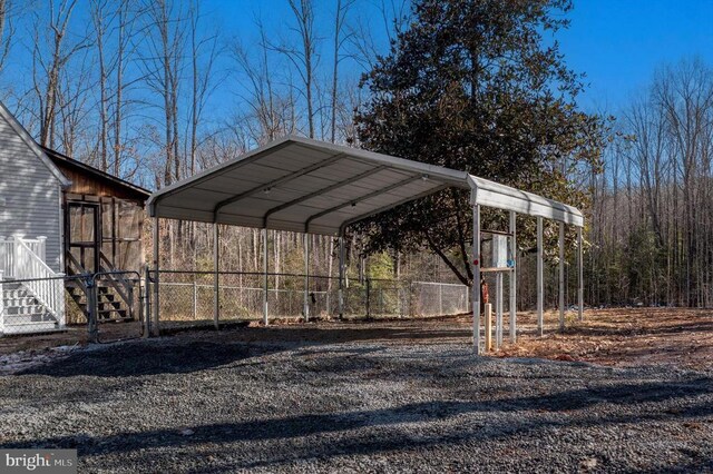 view of car parking featuring a carport