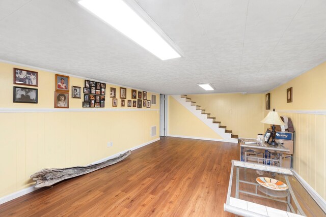 basement featuring hardwood / wood-style flooring