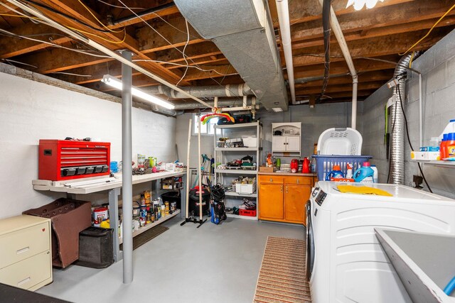 basement featuring washing machine and dryer