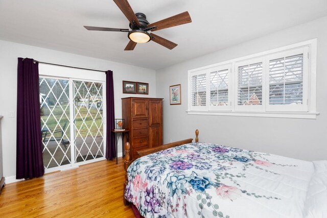 bedroom with ceiling fan and light wood-type flooring