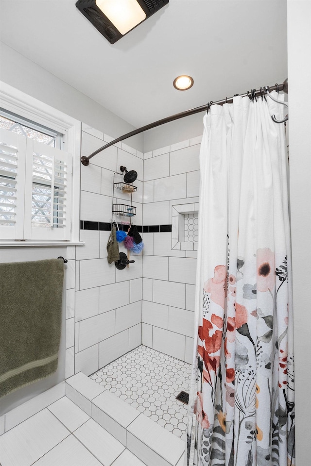 bathroom with a shower with curtain