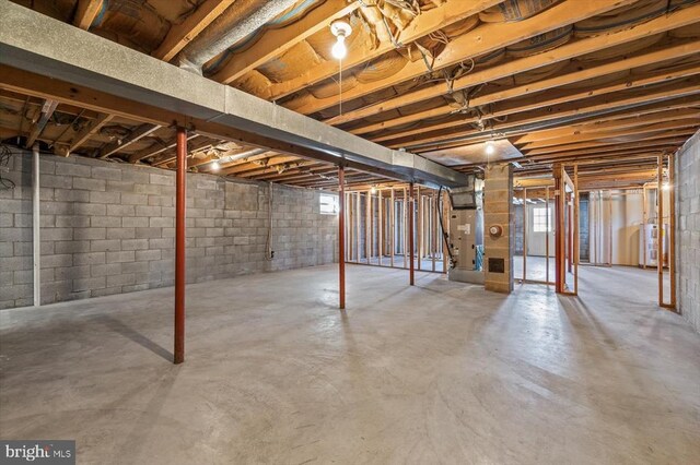 basement featuring water heater