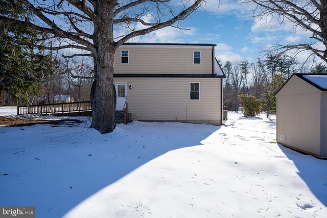 view of snow covered house