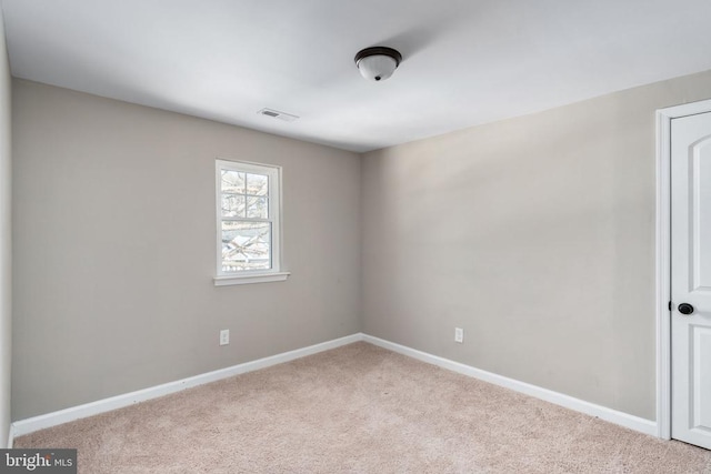 view of carpeted spare room