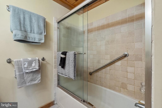full bathroom with enclosed tub / shower combo