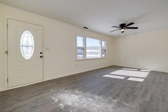 foyer featuring dark hardwood / wood-style flooring and ceiling fan