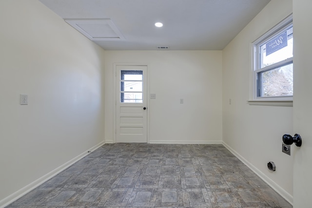 unfurnished room with plenty of natural light