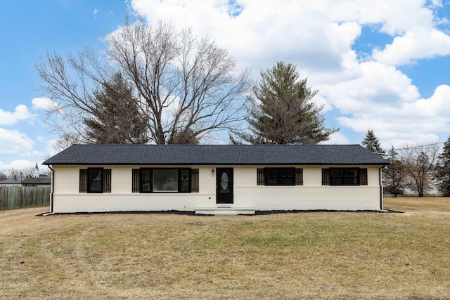 ranch-style house featuring a front lawn