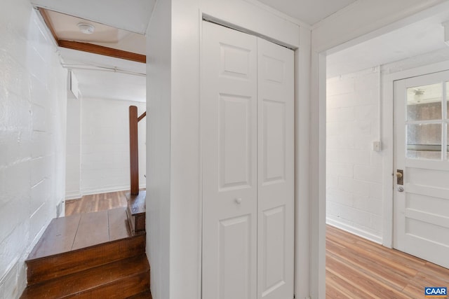 corridor featuring hardwood / wood-style flooring