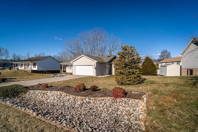 ranch-style home with a garage, a residential view, concrete driveway, and a front lawn