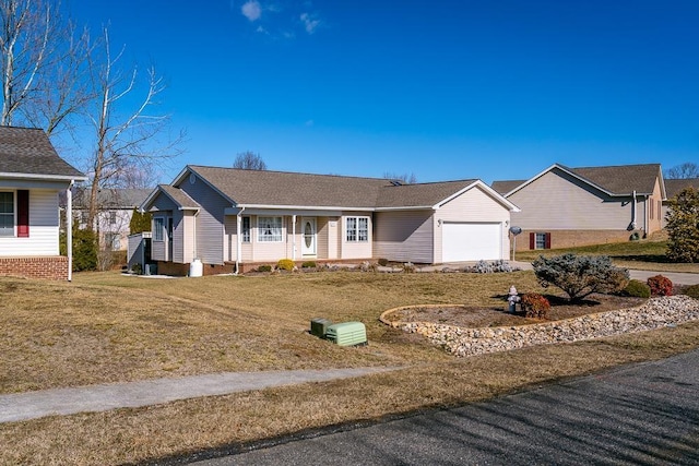 ranch-style home with an attached garage and a front yard